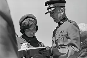 Jacqueline Kennedy Signing a Visitor's Book