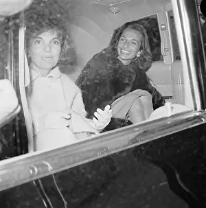 Jacqueline Kennedy Sitting in a Car With Her Sister