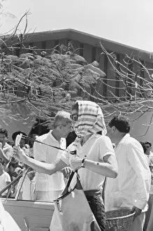 Jacqueline Kennedy with Slingshot on Flea Market Outing