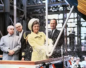 Jacqueline Kennedy smashing Wine Bottle