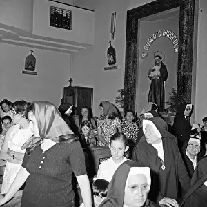 Jacqueline Onassis Conversing With a Nun