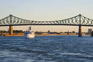 Jacques Cartier Bridge and Ocean liner cruise ship, Montreal, Quebec, Canada