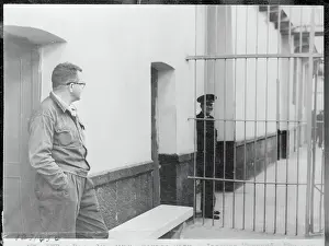 Jacques Mornard Looking Through Federal Penitentiary Gates