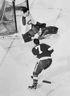 Jacques Plante Blocking a Shot