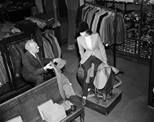 Jake Kauffmann Showing Jackets to Customer