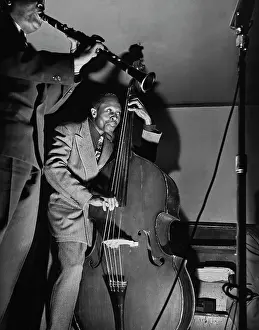 Prints of American jazz double-bassist Al Morgan and American jazz clarinettist Gene Sedric during a jam session, circa 1948. (Photo by European/FPG/Archive Photos/Getty Images) Timeless Moments: A Visual Journey Through History’s Defining Images: Jam Session