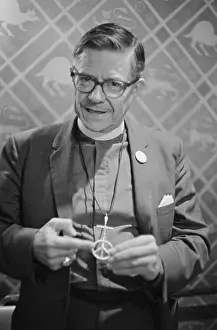 Pike Prints: James A. Pike Pointing to His Peace Necklace