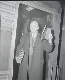 Conant Prints: James B. Conant with Hat and Briefcase Inside Train