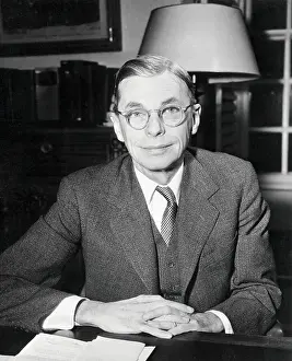 James B. Conant Sitting at Desk