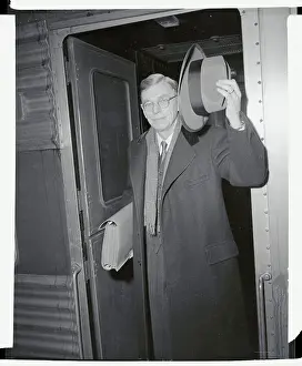 James B. Conant Tipping His Hat on Train