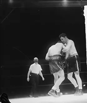 Referee Prints: James Braddock Holding Joe Louis During Boxing Match