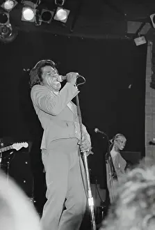 Prints of RESEDA, CA - JANUARY 31: Godfather of Soul James Brown performs onstage at the Country Club on January 31, 1982 in Reseda, California. (Photo by Michael Ochs Archives/Getty Images) Soul Power: A Visual Journey Through the Godfather of Soul’s Electrifying Legacy: James Brown At The Country Club