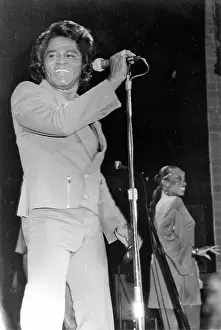 Prints of RESEDA, CA - JANUARY 31: Godfather of Soul James Brown performs onstage at the Country Club on January 31, 1982 in Reseda, California. (Photo by Michael Ochs Archives/Getty Images) Soul Power: A Visual Journey Through the Godfather of Soul’s Electrifying Legacy: James Brown At The Country Club