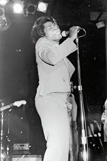 Prints of RESEDA, CA - JANUARY 31: Godfather of Soul James Brown performs onstage at the Country Club on January 31, 1982 in Reseda, California. (Photo by Michael Ochs Archives/Getty Images) Soul Power: A Visual Journey Through the Godfather of Soul’s Electrifying Legacy: James Brown At The Country Club