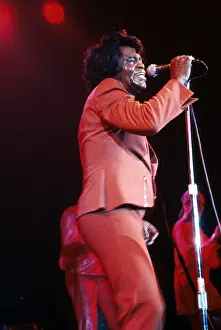 Prints of RESEDA, CA - JANUARY 31: Godfather of Soul James Brown performs onstage at the Country Club on January 31, 1982 in Reseda, California. (Photo by Michael Ochs Archives/Getty Images) Soul Power: A Visual Journey Through the Godfather of Soul’s Electrifying Legacy: James Brown At The Country Club
