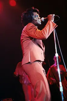 Prints of RESEDA, CA - JANUARY 31: Godfather of Soul James Brown performs onstage at the Country Club on January 31, 1982 in Reseda, California. (Photo by Michael Ochs Archives/Getty Images) Soul Power: A Visual Journey Through the Godfather of Soul’s Electrifying Legacy: James Brown At The Country Club