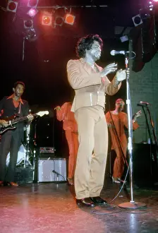 Prints of RESEDA, CA - JANUARY 31: Godfather of Soul James Brown performs onstage at the Country Club on January 31, 1982 in Reseda, California. (Photo by Michael Ochs Archives/Getty Images) Soul Power: A Visual Journey Through the Godfather of Soul’s Electrifying Legacy: James Brown At The Country Club