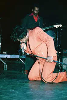 Prints of RESEDA, CA - JANUARY 31: Godfather of Soul James Brown performs onstage at the Country Club on January 31, 1982 in Reseda, California. (Photo by Michael Ochs Archives/Getty Images) Soul Power: A Visual Journey Through the Godfather of Soul’s Electrifying Legacy: James Brown At The Country Club