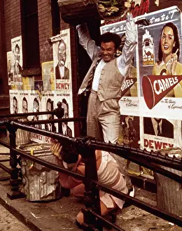 James Caan Holding a Trash Can