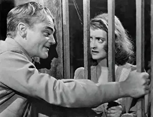 James Cagney and Bette Davis in The Bride Came COD