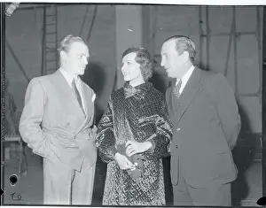 Prints of (Original Caption). James Cagney, Mary Brian and Hugh Herbert (left to right), pictured as they attended the All Star Show of 1935, sponsored by Joe E Capturing Cagney: A Glimpse into Hollywood's Tough Guy: James Cagney Talking With Friends