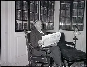 Library Prints: James Curley Reading Paper