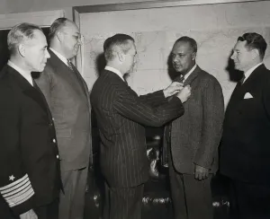 John L Prints: James Forrestal Giving Award to Lester Granger