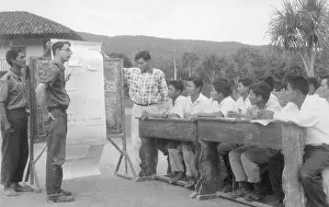 Volunteer Prints: James Hughes As He Instructs A Group
