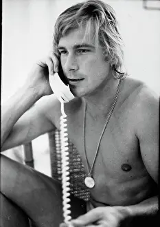 Prints of James Hunt (1947 - 1993), 29, at home on the telephone, UK, 16th September 1977. (Photo by Ben Martin/Getty Images) Legends of the Track: James Hunt