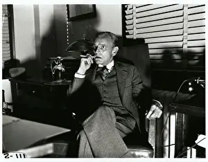 James M Prints: James M Landis Sitting and Smoking