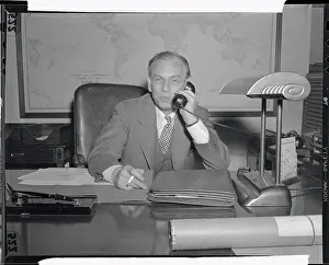 James M Prints: James M Landis Speaking on Telephone
