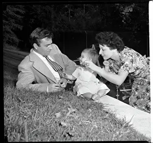 James Mason With Wife and Daughter in the Garden of Their Home