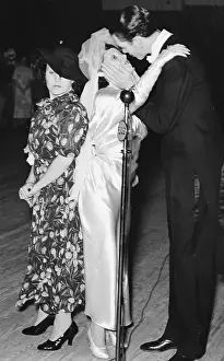 James Moore and Violet Hilton Kissing at Wedding