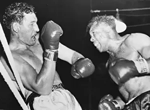 Blocking Prints: James Parker Blocking Archie Moore Punch