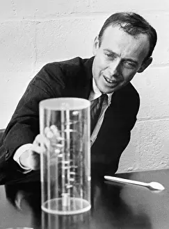 James D Prints: James Watson with a Model for DNA
