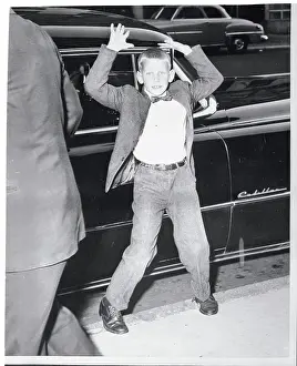 James Woodward Standing in Front of House