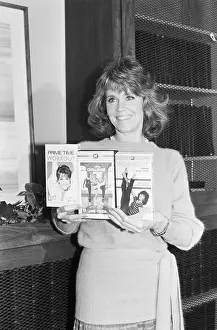 Fitness Prints: Jane Fonda Holding Workout Tapes