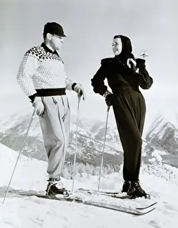 Prints of (Original Caption) 1/13/1948- Sun Valley, ID: Jane Russell, who is spending some time at Sun Valley learning to ski, pauses with her instructor Toni Matt Hollywood's Sultry Siren – A Photographic Tribute: Jane Russell In Ski Gear