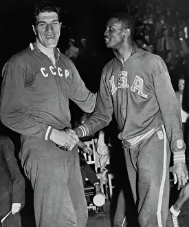 Prints of Soviet-Latvian basketball player Janis Krumins shaking hands with team USA's Bill Russell at the Summer Olympics in Melbourne, Australia, November 29th 1956 Bettmann Archive Prints: Janis Krumins And Bill Russell