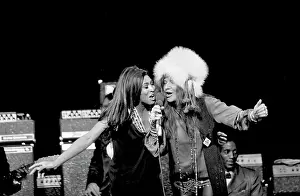 Prints of NEW YORK - NOVEMBER 27: Rock and roll singers Janis Joplin and Tina Turner perform on stage at Madsion Square Garden, New York on November 27, 1969. (Photo by Michael Ochs Archives/Getty Images) Classic Prints of Iconic Janis Joplin: Janis & Tina Performing