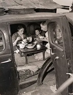 Post Prints: Japanese Family Eat Dinner in Automobile