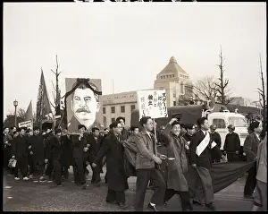 Japanese Marchers with Portrait of Stalin