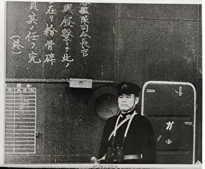 Japanese Naval Officer Posing by Bulletin Board