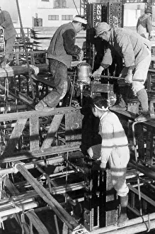 Riveter Prints: Japanese Riverts Work High Above Street