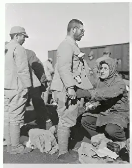 Japanese Soldier Being Searched