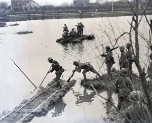 Japanese Soldiers In Boats Ford Stream
