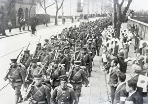 Japanese Soldiers March Thru China