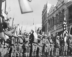 Capturing Prints: Japanese Soldiers Raising Arms & Rifles