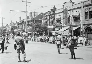 Japanese Soldiers Watching Chinese Citizens