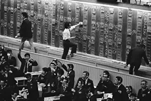Japanese Stock Exchange Workers in a Frenzy